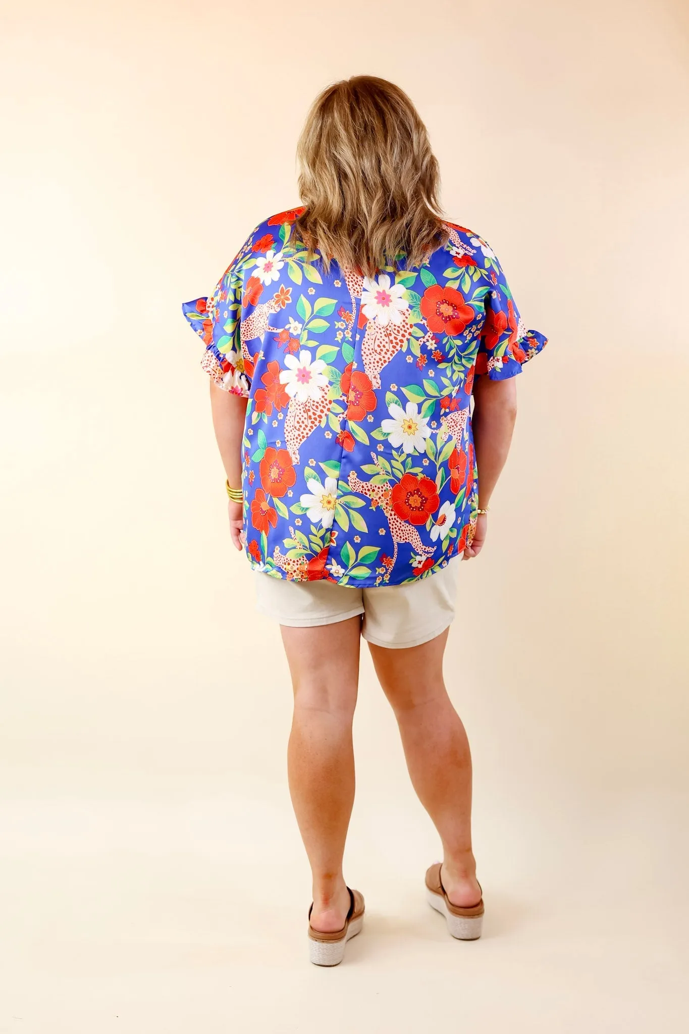 Best Version Floral and Cheetah Print V Neck Top with Ruffle Short Sleeves in Blue