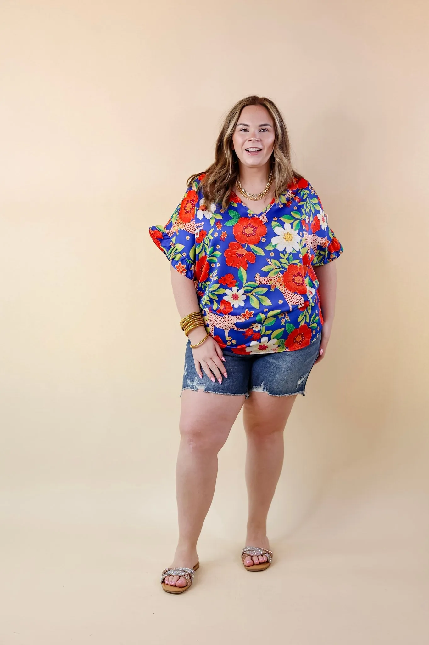 Best Version Floral and Cheetah Print V Neck Top with Ruffle Short Sleeves in Blue