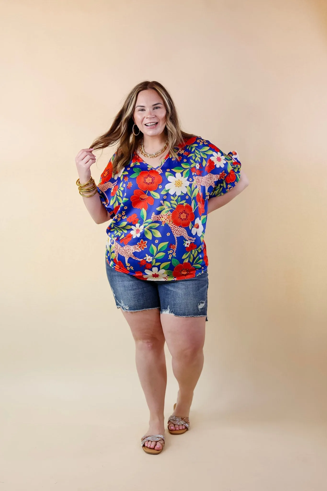 Best Version Floral and Cheetah Print V Neck Top with Ruffle Short Sleeves in Blue